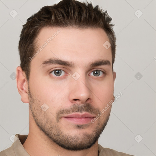 Neutral white young-adult male with short  brown hair and grey eyes