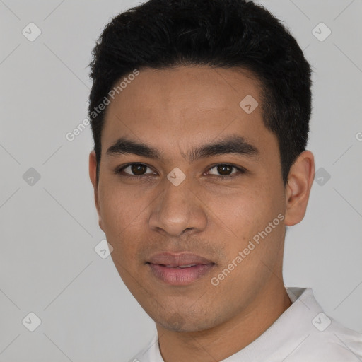 Neutral latino young-adult male with short  black hair and brown eyes