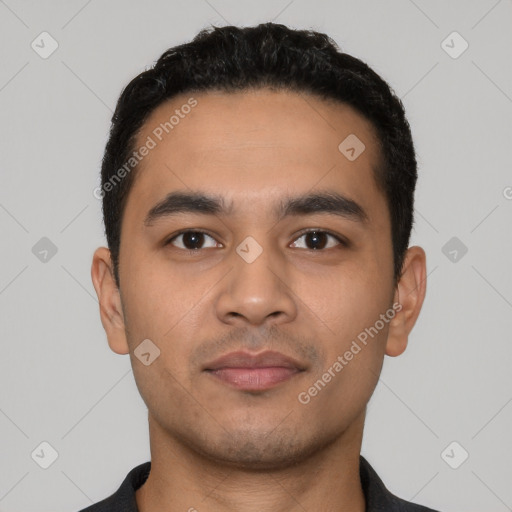 Neutral latino young-adult male with short  black hair and brown eyes