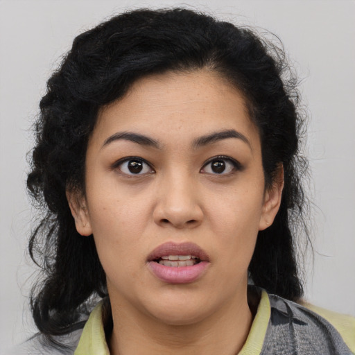 Neutral latino young-adult female with medium  black hair and brown eyes