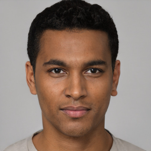 Neutral black young-adult male with short  black hair and brown eyes