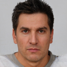 Neutral white adult male with short  brown hair and brown eyes
