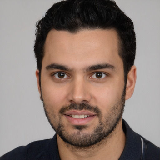 Neutral white young-adult male with short  black hair and brown eyes