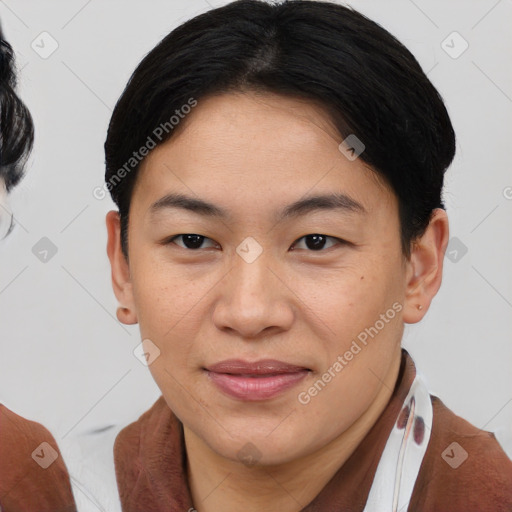 Joyful asian young-adult female with short  brown hair and brown eyes