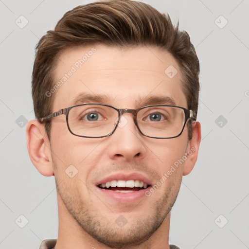 Joyful white adult male with short  brown hair and grey eyes