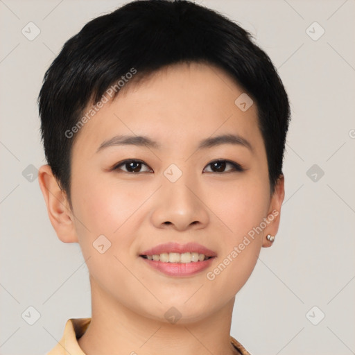 Joyful asian young-adult female with short  black hair and brown eyes