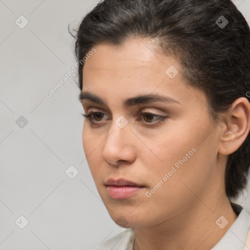 Neutral white young-adult female with medium  brown hair and brown eyes