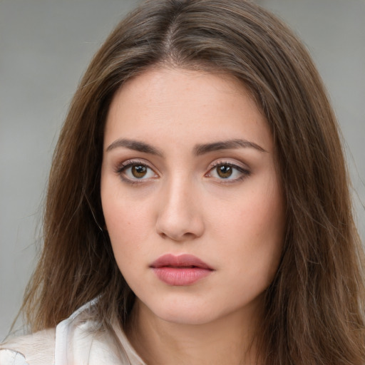 Neutral white young-adult female with medium  brown hair and brown eyes