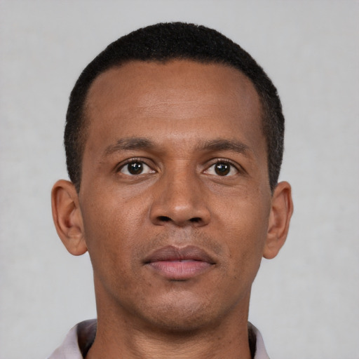 Neutral black young-adult male with short  brown hair and brown eyes