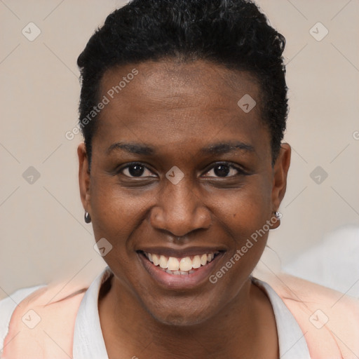 Joyful black young-adult female with short  brown hair and brown eyes