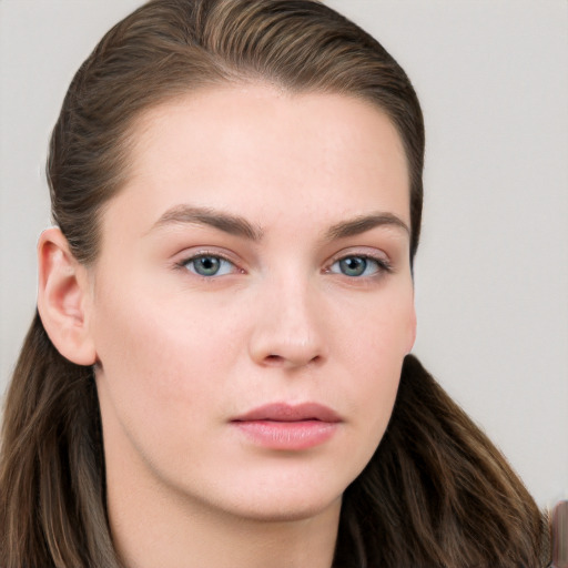 Neutral white young-adult female with long  brown hair and grey eyes