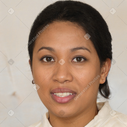 Joyful latino young-adult female with short  brown hair and brown eyes