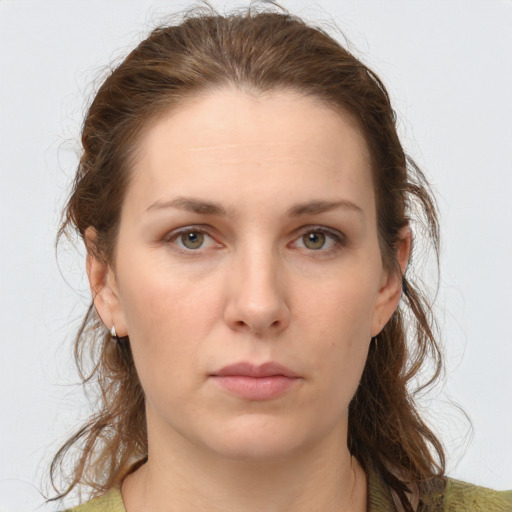 Neutral white young-adult female with medium  brown hair and grey eyes