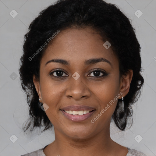 Joyful black young-adult female with medium  black hair and brown eyes