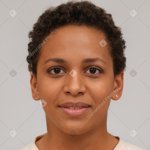 Joyful black young-adult female with short  brown hair and brown eyes