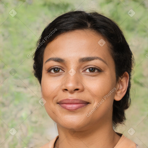 Joyful latino young-adult female with medium  brown hair and brown eyes