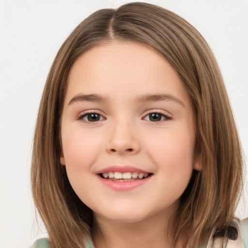 Joyful white child female with medium  brown hair and brown eyes