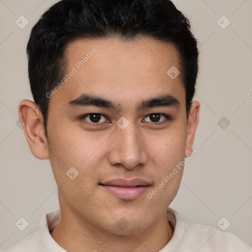 Joyful latino young-adult male with short  brown hair and brown eyes