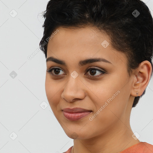 Joyful latino young-adult female with short  brown hair and brown eyes