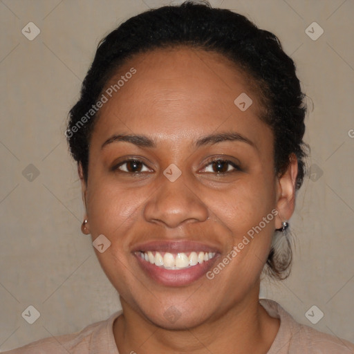 Joyful black adult female with short  brown hair and brown eyes