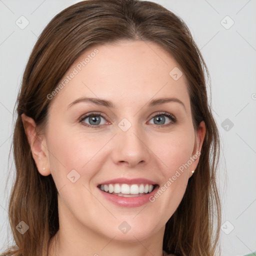 Joyful white young-adult female with long  brown hair and grey eyes