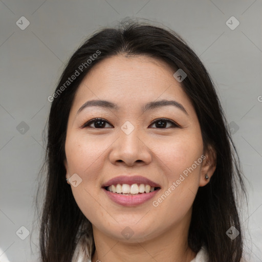 Joyful asian young-adult female with medium  brown hair and brown eyes