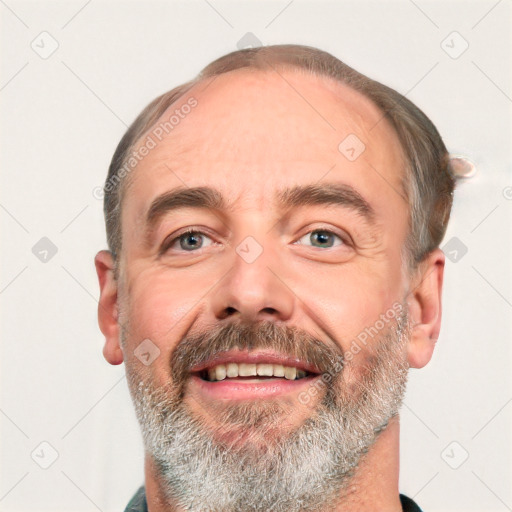 Joyful white middle-aged male with short  brown hair and brown eyes