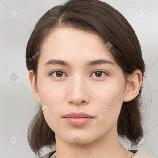 Neutral white young-adult female with medium  brown hair and brown eyes