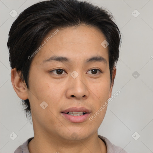 Joyful asian young-adult female with short  brown hair and brown eyes