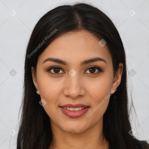 Joyful latino young-adult female with long  brown hair and brown eyes