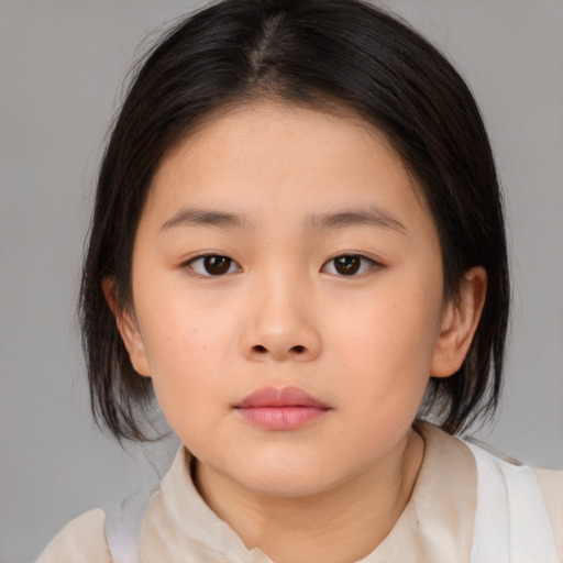 Neutral asian child female with medium  brown hair and brown eyes