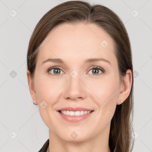 Joyful white young-adult female with long  brown hair and grey eyes