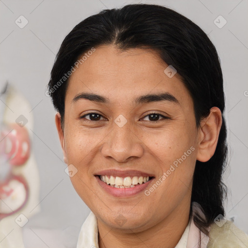 Joyful asian young-adult female with medium  brown hair and brown eyes