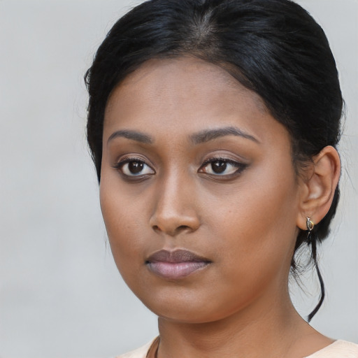 Neutral asian young-adult female with medium  brown hair and brown eyes