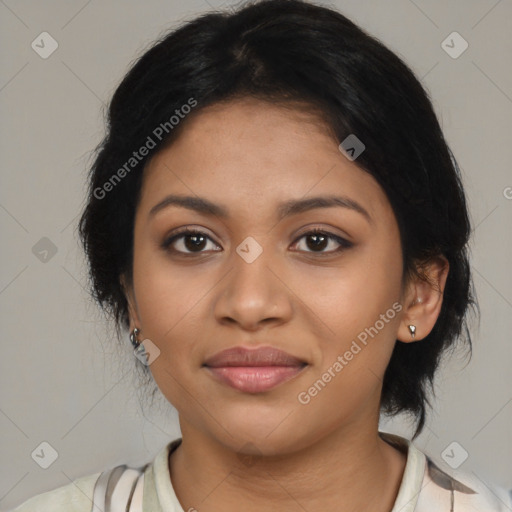 Joyful latino young-adult female with medium  brown hair and brown eyes