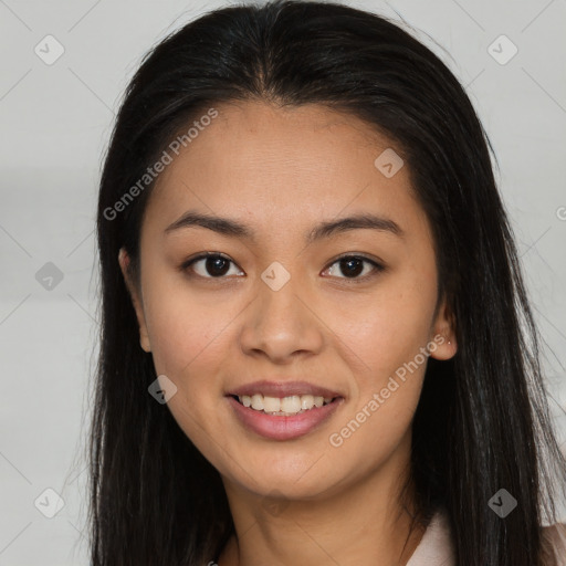 Joyful asian young-adult female with long  brown hair and brown eyes