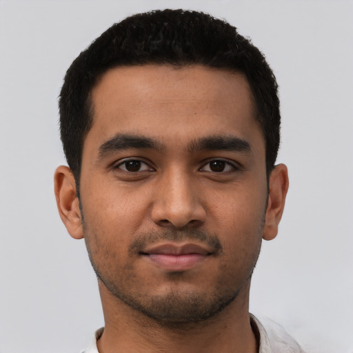 Neutral latino young-adult male with short  black hair and brown eyes