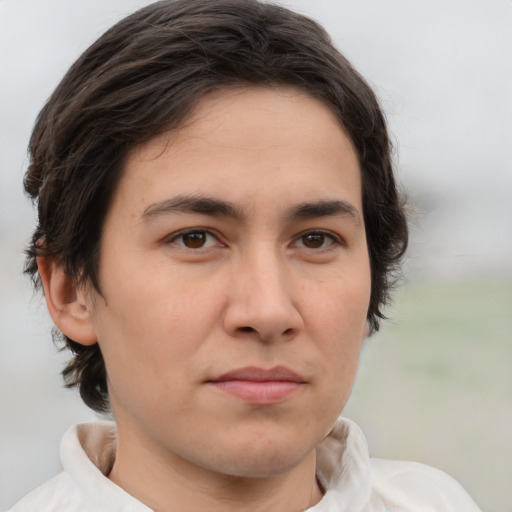 Joyful white young-adult male with medium  brown hair and brown eyes