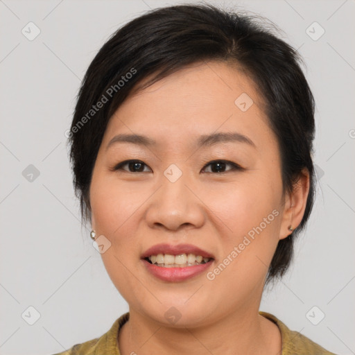 Joyful asian young-adult female with medium  brown hair and brown eyes