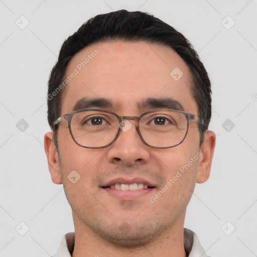 Joyful white young-adult male with short  black hair and brown eyes