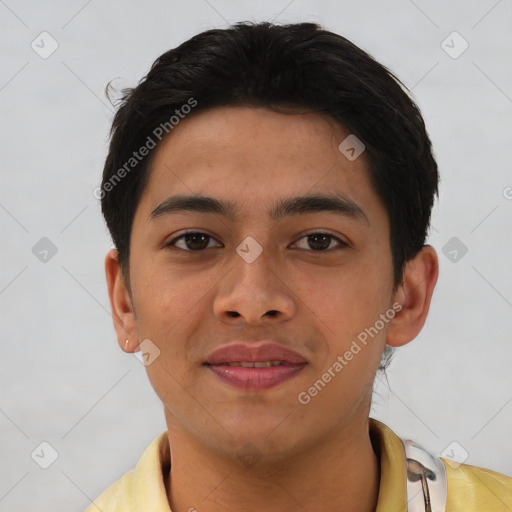 Joyful asian young-adult male with short  brown hair and brown eyes