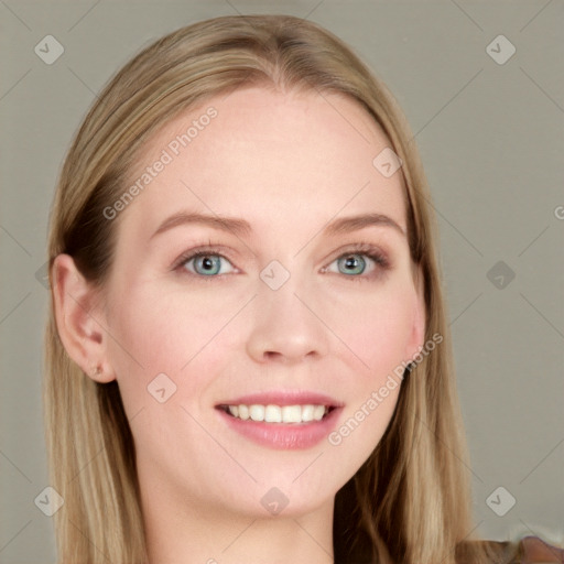 Joyful white young-adult female with long  brown hair and blue eyes