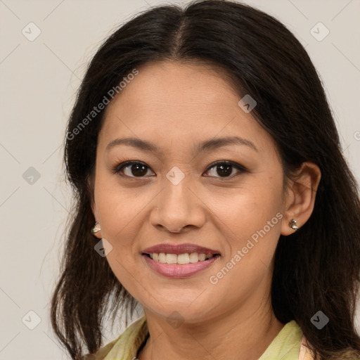 Joyful white adult female with medium  brown hair and brown eyes