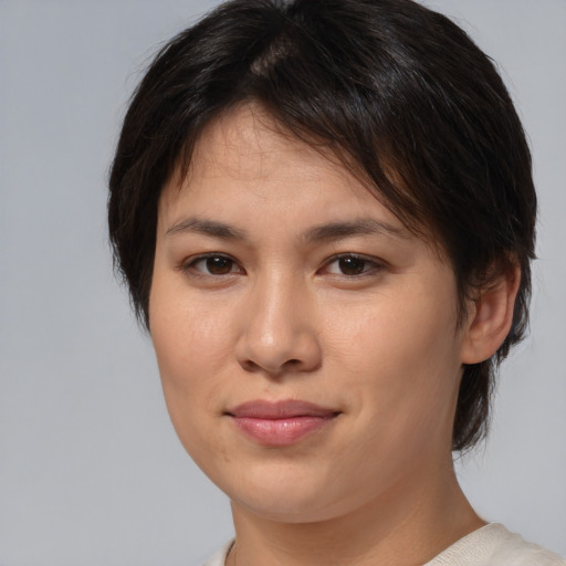 Joyful white young-adult female with medium  brown hair and brown eyes