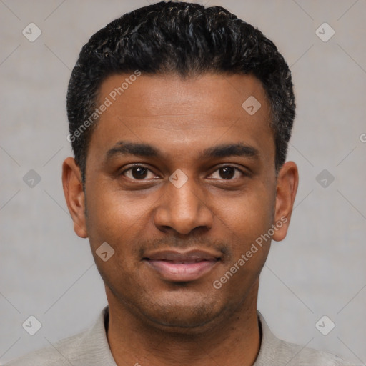 Joyful latino young-adult male with short  black hair and brown eyes