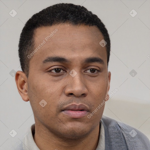 Neutral latino young-adult male with short  black hair and brown eyes