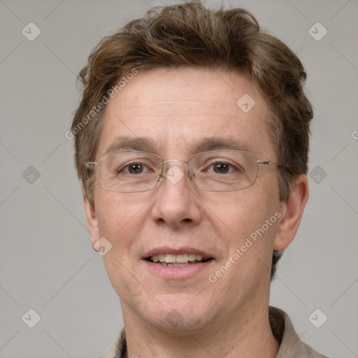 Joyful white adult male with short  brown hair and grey eyes