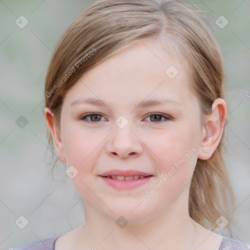 Joyful white child female with medium  brown hair and blue eyes