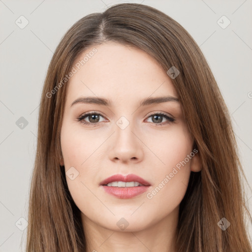 Neutral white young-adult female with long  brown hair and brown eyes