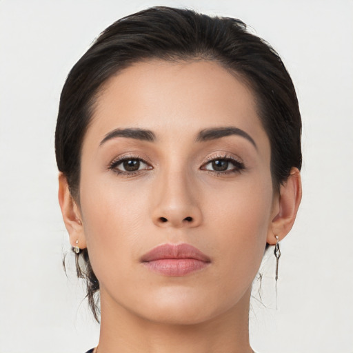 Neutral asian young-adult female with medium  brown hair and brown eyes